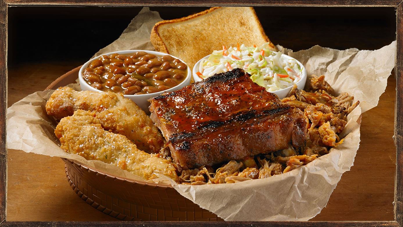 Slow-smoked ribs glazed with BBQ sauce