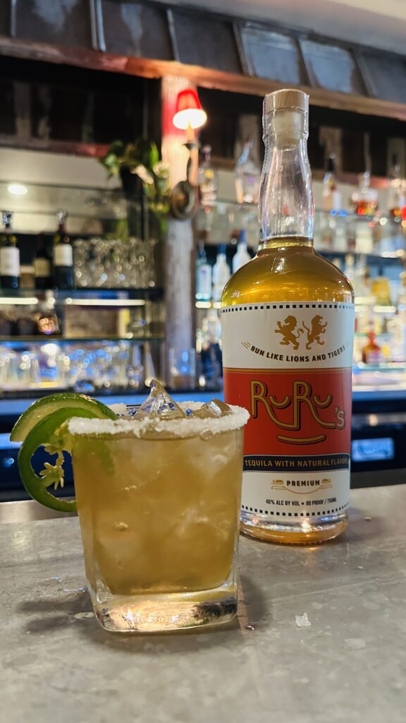 Ruru’s Tequila bottle on bar top